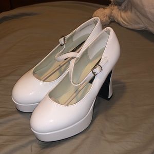 White Funtasma Mary Jane platform heels.